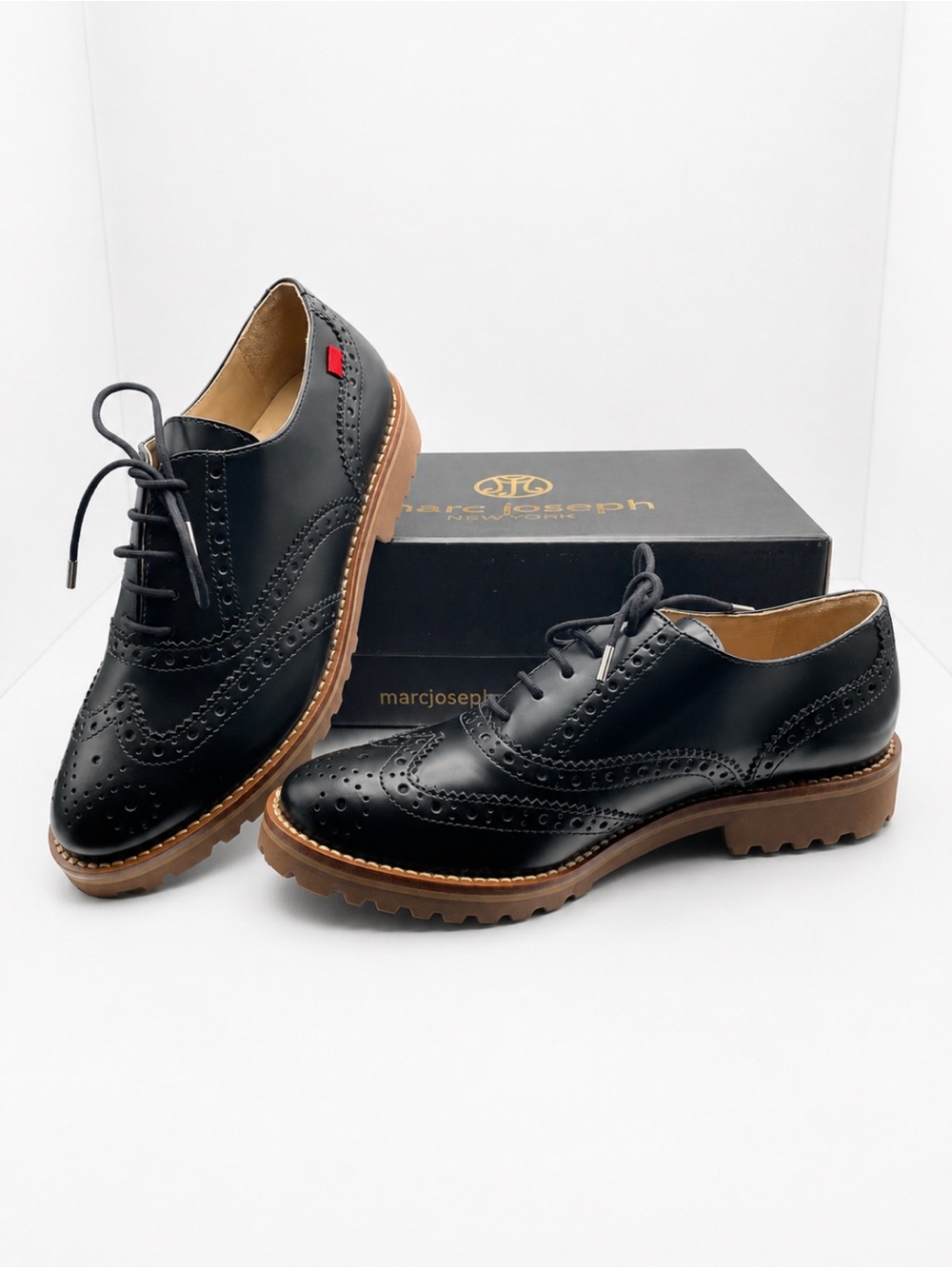 Marc Joseph Black Leather Wingtip Derby Oxfords with Brown Lug Sole
